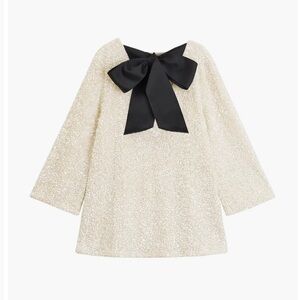 White sequin holiday dress with bow